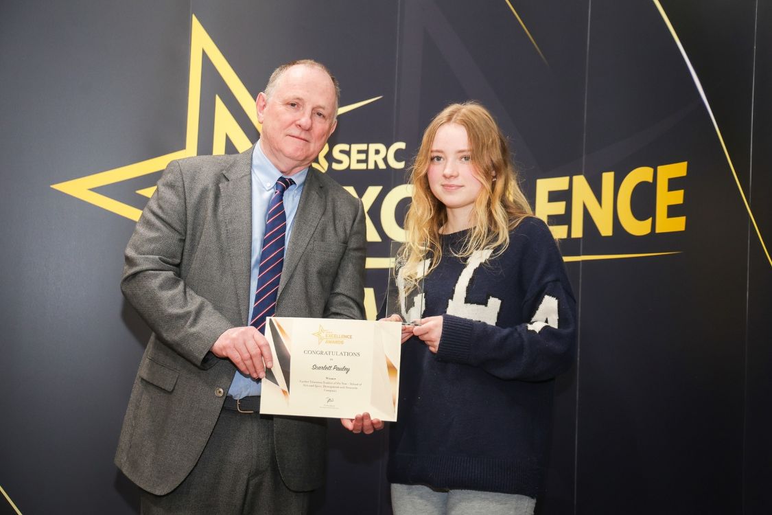 Students being presented with an Award